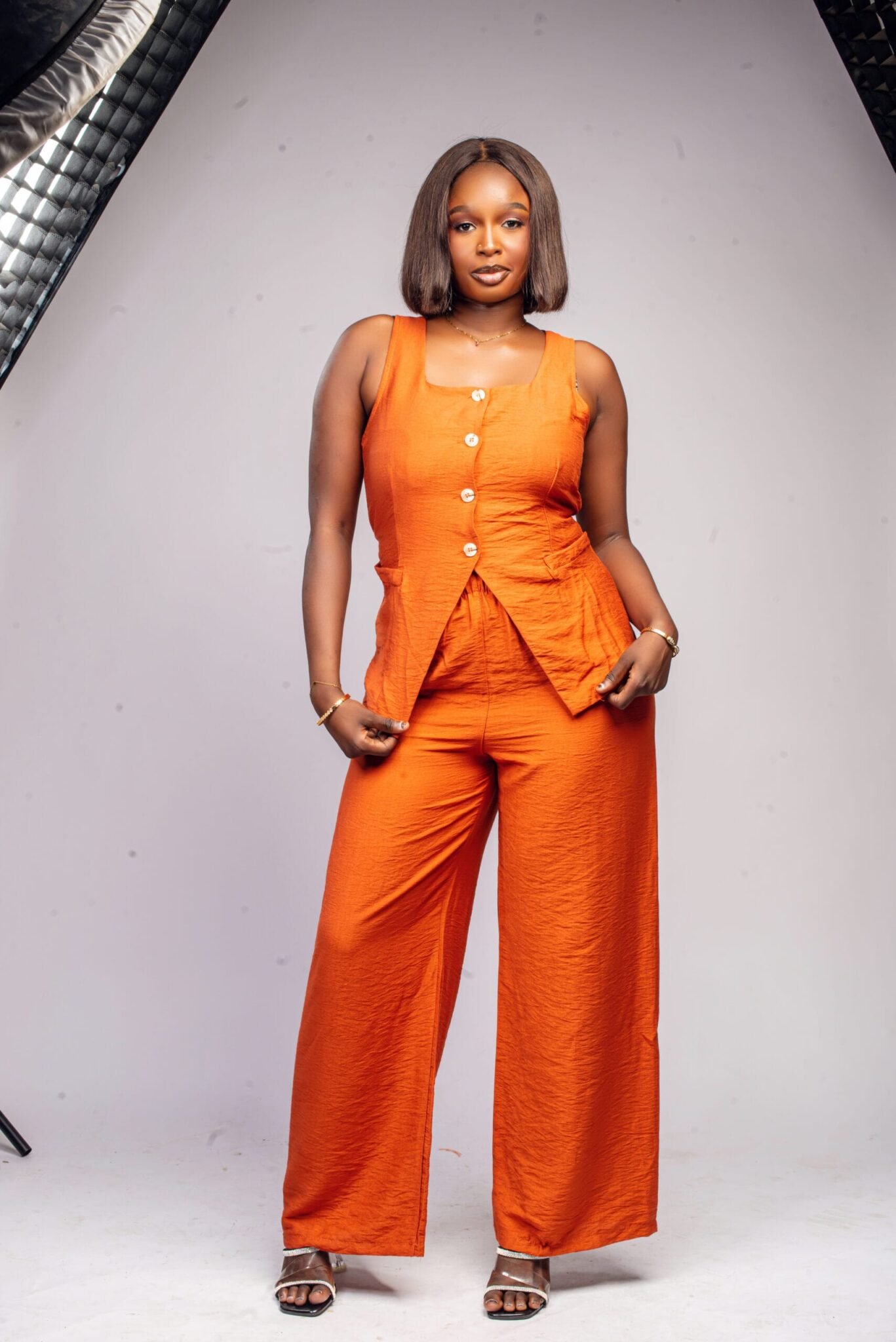 Ensemble orange sans manches bas en pointe et lacets au dos