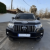 Location de véhicule avec chauffeur Toyota Prado intérieur cuir beige 5 places